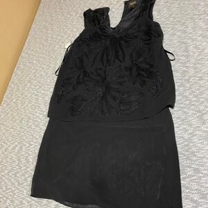 Laundry black dress with beaded details and bow tie back. Size women 6. SKU784